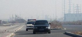 几天来停靠在港北监狱门外的警车和昌黎县六一零专车