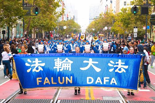 '图6～8：法轮功学员参加菲律宾文化节游行受欢迎'