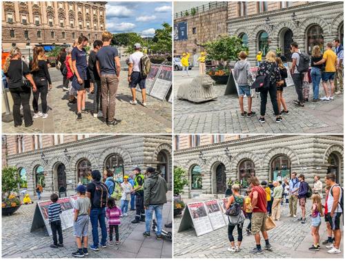 '图6：瑞典民众观看真相展板，了解法轮功真相。'